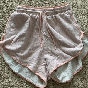 Blush gym shark shorts